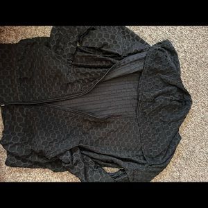 from a local boutique, black zip up textured jacket with matching tank